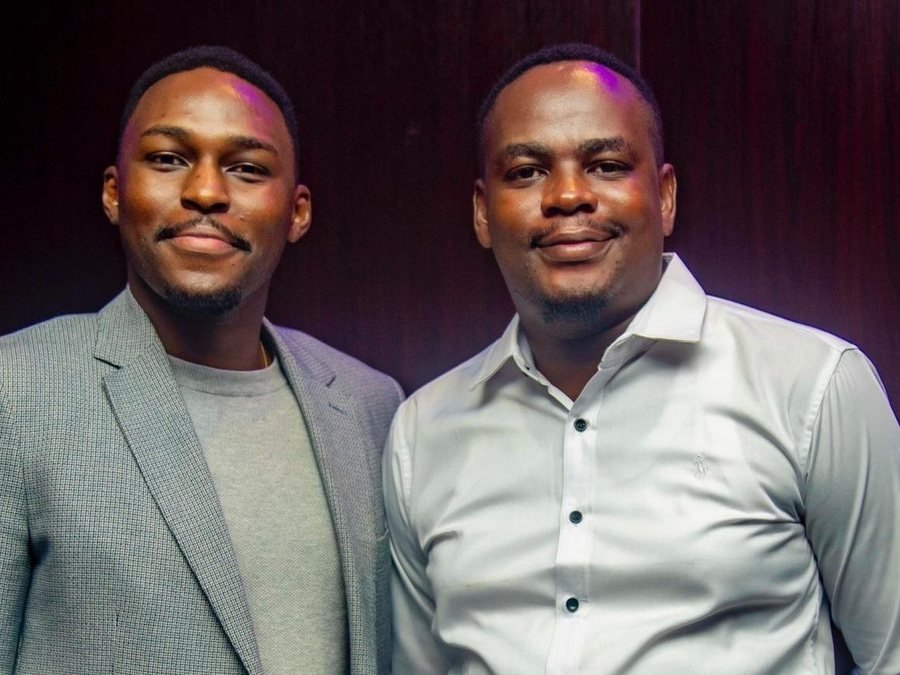 Peter Mkwawa with a colleague at an industry event in Dar es Salaam