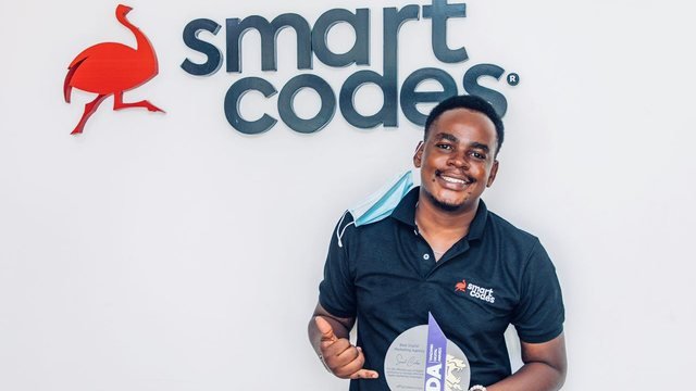 Peter Mkwawa receiving an industry award